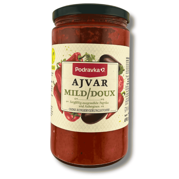 Podravka Ajvar mild 690 g, Glasverpackung mit Produktname, Marke und Abbildung eines milden Paprika-Auberginen-Aufstrichs.